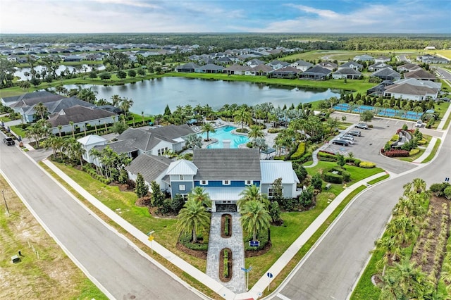 4625 Canoe Creek Ave, Parrish, FL 34219 - aerial view of residential area with a nearby body of water and a pool