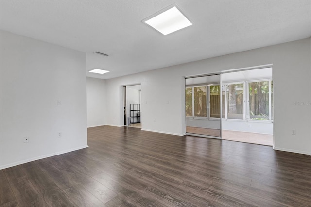 5356 Royal Palm Ave Unit 5356, Sarasota, FL 34234 - empty room featuring wood finished floors and baseboards
