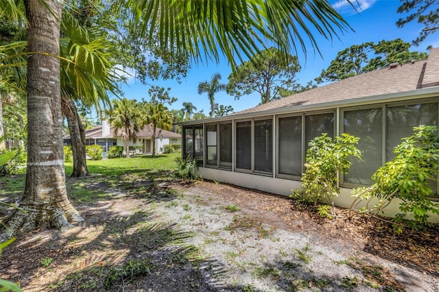 5356 Royal Palm Ave Unit 5356, Sarasota, FL 34234 - view of yard with a sunroom