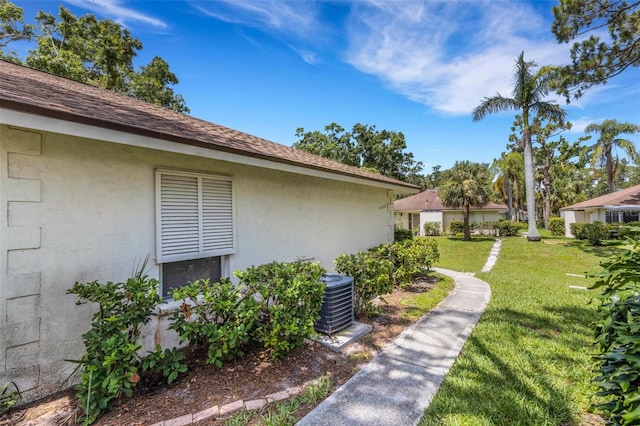 5356 Royal Palm Ave Unit 5356, Sarasota, FL 34234 - view of grassy yard featuring central AC