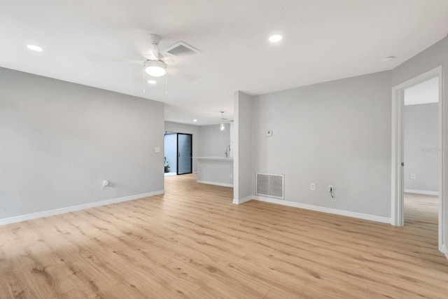 5192 Cedar Hammock Ln, Sarasota, FL 34232 - unfurnished room with a ceiling fan, light wood finished floors, baseboards, and recessed lighting
