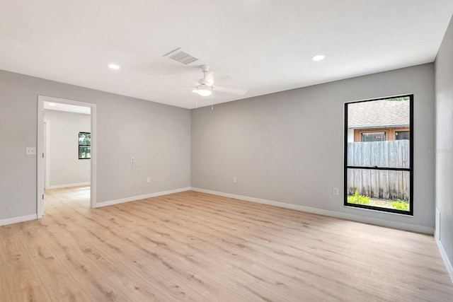 5192 Cedar Hammock Ln, Sarasota, FL 34232 - spare room featuring light wood-style floors, baseboards, recessed lighting, and a ceiling fan