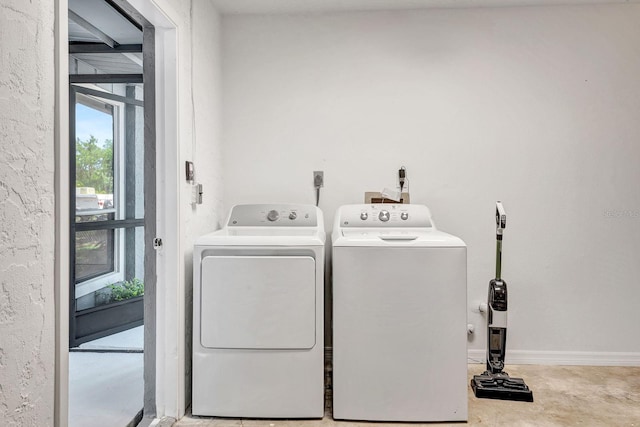 5192 Cedar Hammock Ln, Sarasota, FL 34232 - washroom with washing machine and clothes dryer