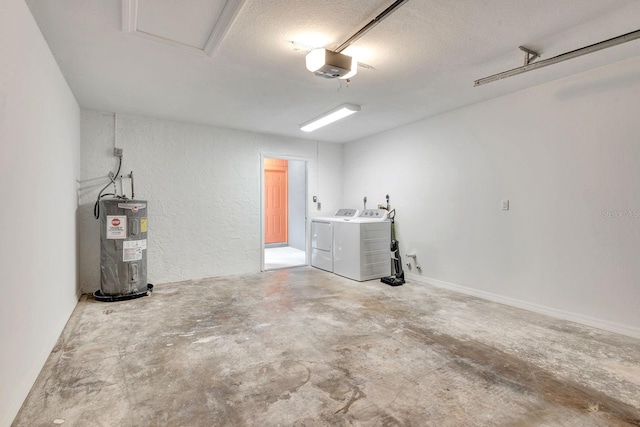 5192 Cedar Hammock Ln, Sarasota, FL 34232 - garage with independent washer and dryer, electric water heater, and a garage door opener
