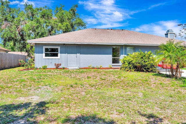 5192 Cedar Hammock Ln, Sarasota, FL 34232 - back of house featuring a shingled roof