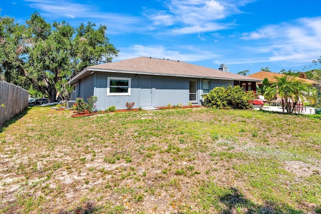 5192 Cedar Hammock Ln, Sarasota, FL 34232 - rear view of property featuring central AC