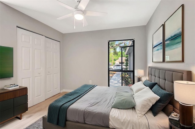 5192 Cedar Hammock Ln, Sarasota, FL 34232 - bedroom featuring light wood-style floors, a closet, and ceiling fan