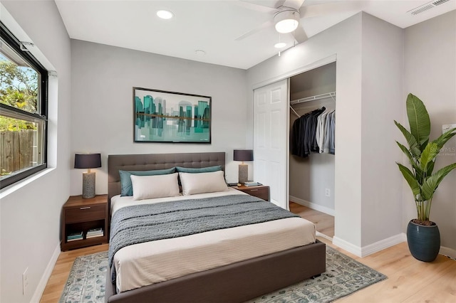 5192 Cedar Hammock Ln, Sarasota, FL 34232 - bedroom with light wood finished floors, baseboards, a closet, recessed lighting, and a ceiling fan