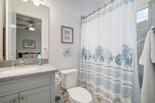 10423 Morning Marsh Ln, Parrish, FL 34219 - full bathroom featuring vanity, toilet, a ceiling fan, and a shower with curtain