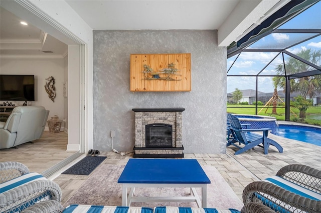 10423 Morning Marsh Ln, Parrish, FL 34219 - view of patio with a fireplace, glass enclosure, and a pool with connected hot tub