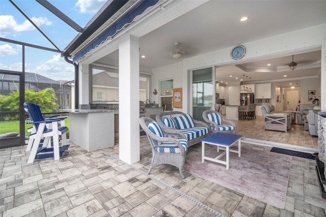 10423 Morning Marsh Ln, Parrish, FL 34219 - view of patio / terrace featuring exterior kitchen and a lanai