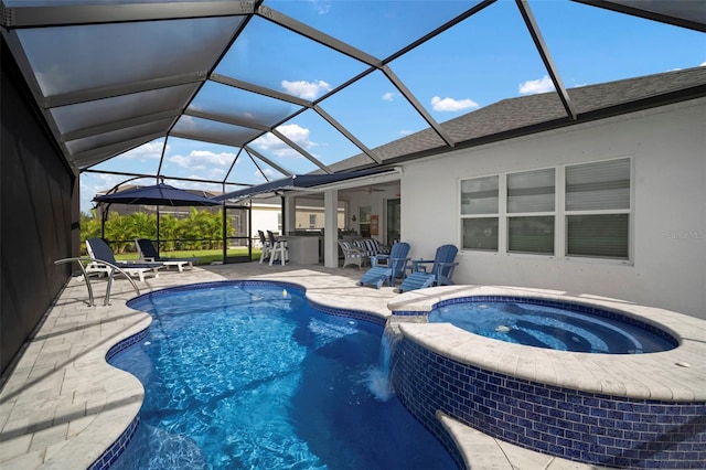 10423 Morning Marsh Ln, Parrish, FL 34219 - view of pool featuring a patio, a lanai, a pool with connected hot tub, and ceiling fan