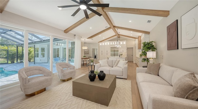 6641 Saint James Xing, University Park, FL 34201 - living room featuring beam ceiling, ceiling fan, light wood-style floors, a sunroom, and recessed lighting