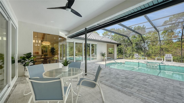 6641 Saint James Xing, University Park, FL 34201 - sunroom featuring a swimming pool, a jacuzzi, and a ceiling fan