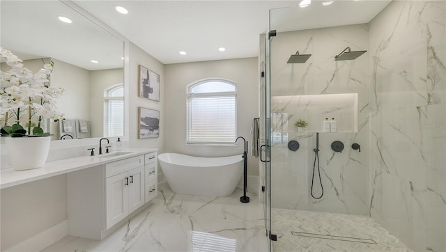 6641 Saint James Xing, University Park, FL 34201 - bathroom with a marble finish shower, vanity, a freestanding tub, marble finish flooring, and recessed lighting