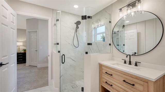 6641 Saint James Xing, University Park, FL 34201 - full bathroom featuring vanity, a marble finish shower, and marble look tile flooring