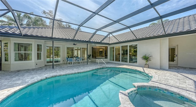 6641 Saint James Xing, University Park, FL 34201 - view of pool featuring a patio area, ceiling fan, a pool with connected hot tub, and a lanai