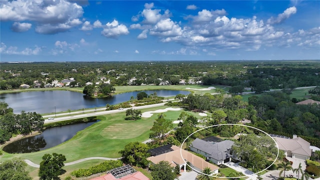 6641 Saint James Xing, University Park, FL 34201 - aerial view of residential area with a nearby body of water, a tree filled landscape, and a golf course