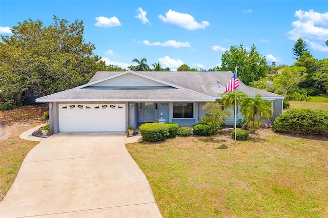 7615 17th Ave W, Bradenton, FL 34209 - single story home with an attached garage, a front lawn, concrete driveway, a shingled roof, and brick siding