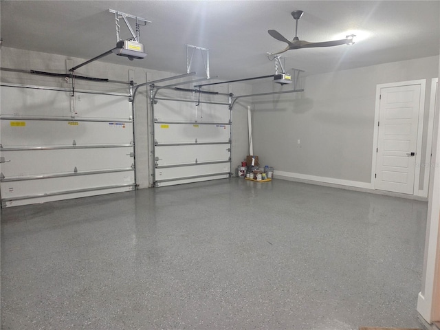 3574 Recurve Cir, Sarasota, FL 34240 - garage with a garage door opener and ceiling fan