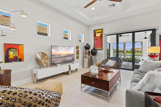 5740 Eagle Creek Rd, Sarasota, FL 34238 - living room featuring a ceiling fan, coffered ceiling, crown molding, baseboards, and beamed ceiling