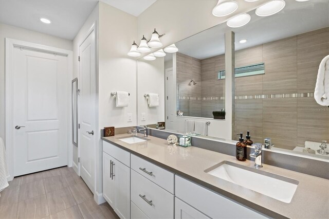 5740 Eagle Creek Rd, Sarasota, FL 34238 - bathroom featuring double vanity, walk in shower, and recessed lighting