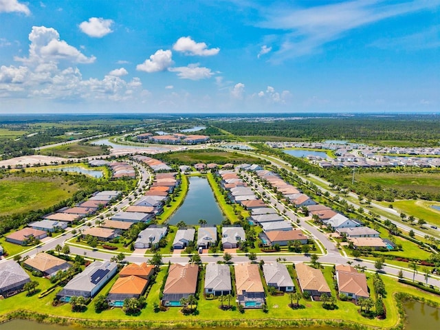 5740 Eagle Creek Rd, Sarasota, FL 34238 - aerial perspective of suburban area with a nearby body of water
