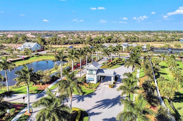 5740 Eagle Creek Rd, Sarasota, FL 34238 - aerial view of property and surrounding area featuring a large body of water, a tree filled landscape, and nearby suburban area