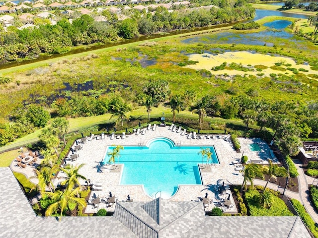 5740 Eagle Creek Rd, Sarasota, FL 34238 - aerial view of a nearby body of water, a pool area, and a tree filled landscape
