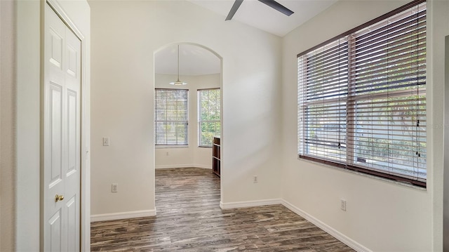 6213 Willet Ct, Lakewood Ranch, FL 34202 - corridor featuring dark wood-type flooring and baseboards