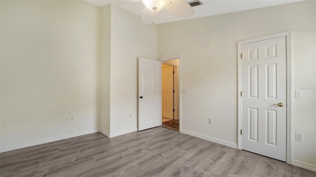 6213 Willet Ct, Lakewood Ranch, FL 34202 - unfurnished bedroom featuring wood finished floors and baseboards