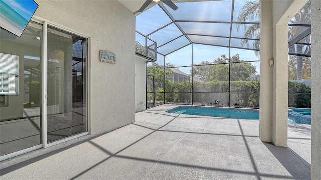 6213 Willet Ct, Lakewood Ranch, FL 34202 - view of swimming pool featuring a patio, glass enclosure, and a pool with connected hot tub