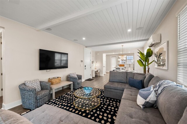 4321 Marina View Way, Cortez, FL 34215 - living room featuring a wall mounted air conditioner, dark wood-style flooring, baseboards, plenty of natural light, and recessed lighting