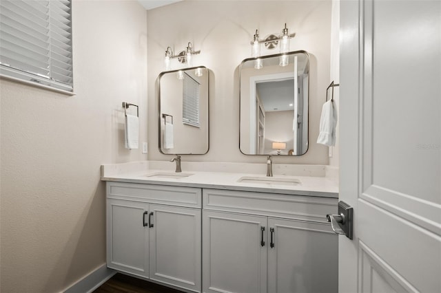 4321 Marina View Way, Cortez, FL 34215 - full bathroom featuring double vanity and baseboards