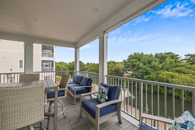 4321 Marina View Way, Cortez, FL 34215 - wooden terrace featuring an outdoor hangout area and a water view