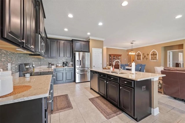 18620 Cortes Creek Blvd, Spring Hill, FL 34610 - kitchen featuring stainless steel appliances, a sink, ornamental molding, tasteful backsplash, and light tile patterned flooring