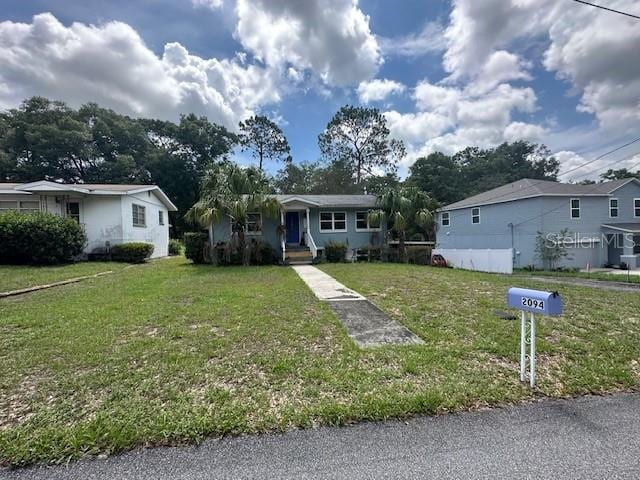 2094 Penn Dr, Deland, FL 32724 - view of front of house featuring a front yard