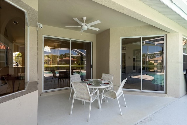 4257 Hearthstone Dr, Sarasota, FL 34238 - view of patio with ceiling fan and outdoor dining area