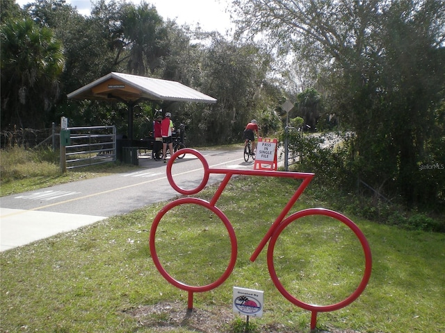 4257 Hearthstone Dr, Sarasota, FL 34238 - surrounding community with a lawn