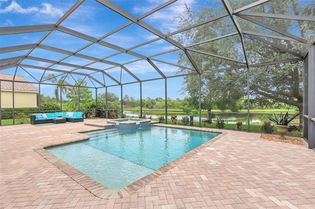 12710 Stone Ridge Pl, Lakewood Ranch, FL 34202 - view of swimming pool featuring an outdoor living space, a patio area, and a water view