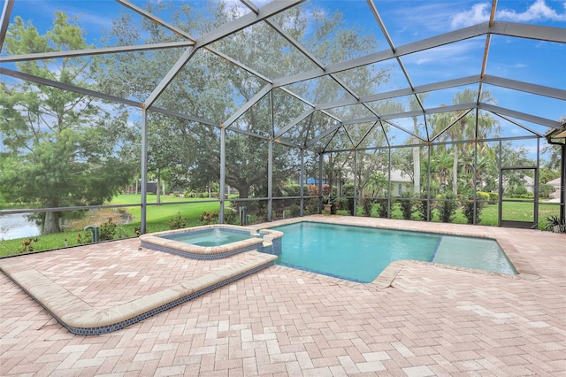 12710 Stone Ridge Pl, Lakewood Ranch, FL 34202 - view of pool featuring a patio area, a pool with connected hot tub, and glass enclosure