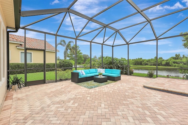 12710 Stone Ridge Pl, Lakewood Ranch, FL 34202 - view of patio featuring outdoor lounge area, a water view, and glass enclosure