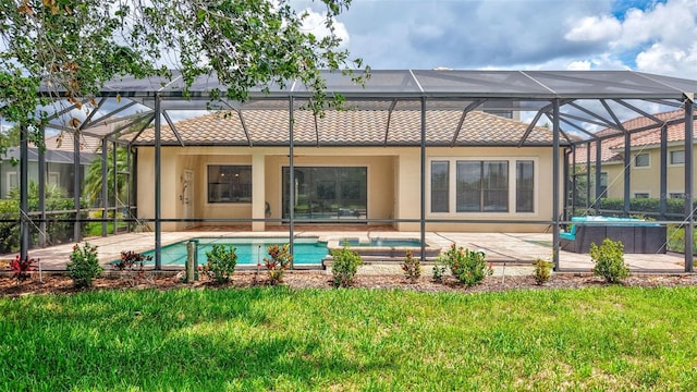 12710 Stone Ridge Pl, Lakewood Ranch, FL 34202 - rear view of property featuring an outdoor hot tub, a lanai, stucco siding, and an outdoor pool