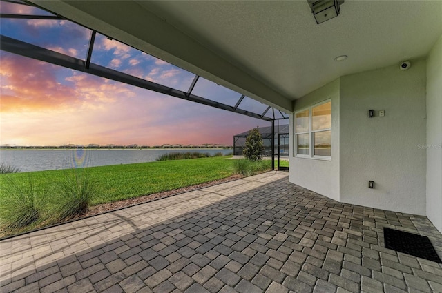 909 Crosswind Ave, Sarasota, FL 34240 - view of patio featuring a water view and a lanai