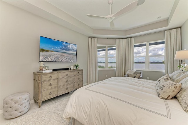 909 Crosswind Ave, Sarasota, FL 34240 - bedroom with baseboards and ceiling fan