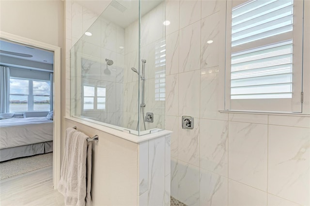 909 Crosswind Ave, Sarasota, FL 34240 - bathroom featuring ensuite bath and a marble finish shower