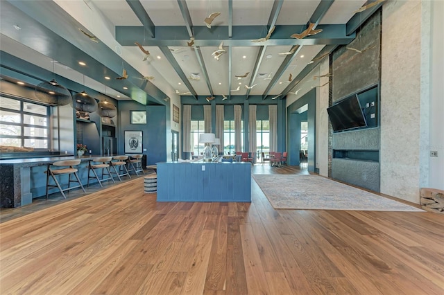 909 Crosswind Ave, Sarasota, FL 34240 - living room with wood finished floors, a fireplace, and recessed lighting