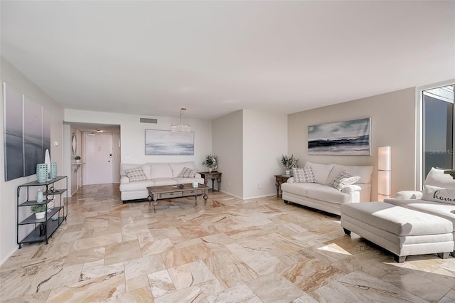 2425 Gulf Of Mexico Dr Unit 14B, Longboat Key, FL 34228 - living room with light marble finish floors
