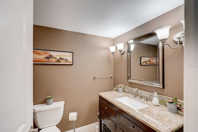 2425 Gulf Of Mexico Dr Unit 14B, Longboat Key, FL 34228 - half bath featuring vanity and toilet