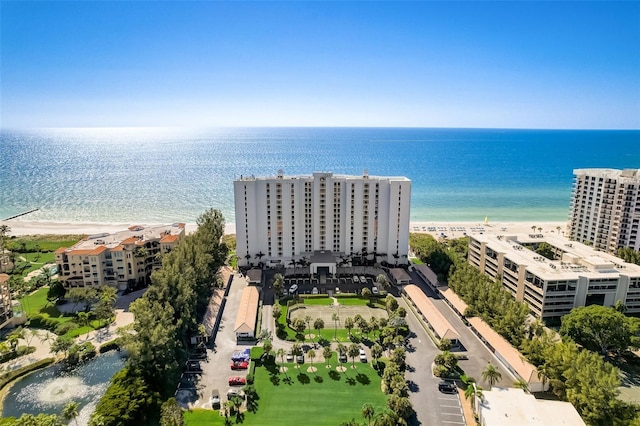 2425 Gulf Of Mexico Dr Unit 14B, Longboat Key, FL 34228 - bird's eye view of waterfront with a beach